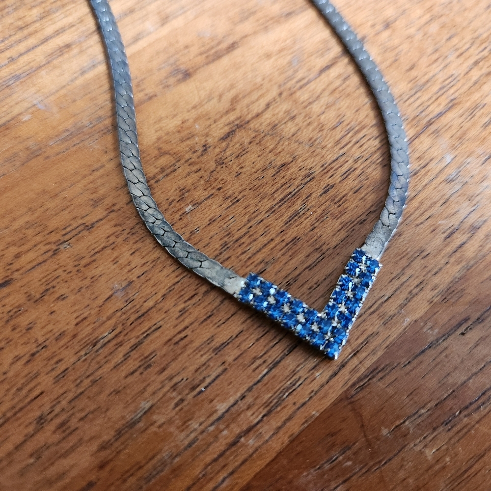 Silver Braided Chocker Necklace With Blue Stone Tip